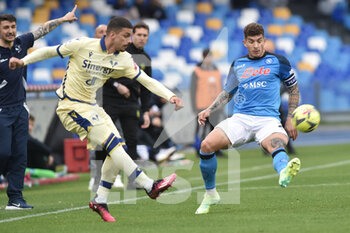 2023-04-15 - Giovanni Di Lorenzo of SSC Napoli competes for the ball with Isak Hien of Hellas Verona FC   during the Serie A match between SSC Napoli vs Hellas Verona at Diego Armando Maradona Stadium  - SSC NAPOLI VS HELLAS VERONA - ITALIAN SERIE A - SOCCER