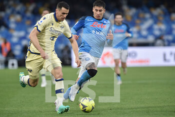 2023-04-15 - Kevin Lasagna of Hellas Verona FC  competes for the ball with Mathias Olivera of SSC Napoli   during the Serie A match between SSC Napoli vs Hellas Verona at Diego Armando Maradona Stadium  - SSC NAPOLI VS HELLAS VERONA - ITALIAN SERIE A - SOCCER