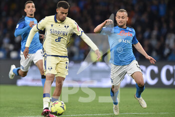 2023-04-15 - Cyril Ngonge of Hellas Verona FC competes for the ball with Stanislav Lobotka of SSC Napoli   during the Serie A match between SSC Napoli vs Hellas Verona at Diego Armando Maradona Stadium  - SSC NAPOLI VS HELLAS VERONA - ITALIAN SERIE A - SOCCER