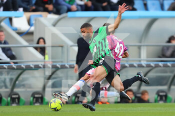 2023-04-16 - Grégoire Defrel of U.S. Sassuolo Calcio competes for the ball with Tommaso Barbieri of Juventus F.C. during the Serie A match between U.S. Sassuolo Calcio and Juventus F.C. at Mapei Stadium-Città del Tricolore on April 16, 2023 in Reggio Emilia, Italy. - US SASSUOLO VS JUVENTUS FC - ITALIAN SERIE A - SOCCER