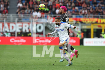 2023-04-23 - Theo Hernandez of AC Milan competes for the ball with Federico Di Francesco of US Lecce during Serie A 2022/23 football match between AC Milan and US Lecce at San Siro Stadium, Milan, Italy on April 23, 2023 - AC MILAN VS US LECCE - ITALIAN SERIE A - SOCCER