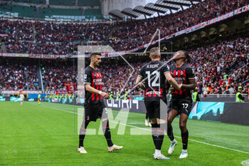 2023-04-23 - Rafael Leao of AC Milan celebrates with his teammates after scoring a goal during Serie A 2022/23 football match between AC Milan and US Lecce at San Siro Stadium, Milan, Italy on April 23, 2023 - AC MILAN VS US LECCE - ITALIAN SERIE A - SOCCER