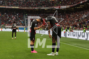 2023-04-23 - Rafael Leao of AC Milan celebrates after scoring a goal with Brahim Diaz of AC Milan during Serie A 2022/23 football match between AC Milan and US Lecce at San Siro Stadium, Milan, Italy on April 23, 2023 - AC MILAN VS US LECCE - ITALIAN SERIE A - SOCCER