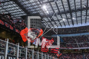 2023-04-23 - AC Milan supporters wave giant flags during Serie A 2022/23 football match between AC Milan and US Lecce at San Siro Stadium, Milan, Italy on April 23, 2023 - AC MILAN VS US LECCE - ITALIAN SERIE A - SOCCER