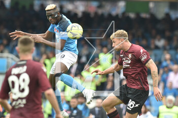 2023-04-30 - Victor Osimhen of SSC Napoli competes for the ball with Matteo Lovato of US Salernitana during the Serie A match between SSC Napoli vs US Salernitana 1919 at Diego Armando Maradano Stadium - SSC NAPOLI VS US SALERNITANA - ITALIAN SERIE A - SOCCER