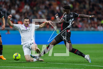 2023-05-03 - Divock Origi of AC Milan competes for the ball with Luka Lochoshvili of US Cremonese during Serie A 2022/23 football match between AC Milan and US Cremonese at San Siro Stadium, Milan, Italy on May 03, 2023 - AC MILAN VS US CREMONESE - ITALIAN SERIE A - SOCCER