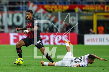 2023-05-03 - Aster Vranckx of AC Milan Pablo Galdames of US Cremonese during Serie A 2022/23 football match between AC Milan and US Cremonese at San Siro Stadium, Milan, Italy on May 03, 2023 - AC MILAN VS US CREMONESE - ITALIAN SERIE A - SOCCER