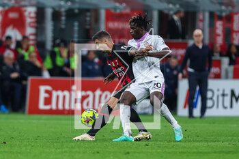 2023-05-03 - Rade Krunic of AC Milan dcompetes for the ball with Felix Afena-Gyan of US Cremonese uring Serie A 2022/23 football match between AC Milan and US Cremonese at San Siro Stadium, Milan, Italy on May 03, 2023 - AC MILAN VS US CREMONESE - ITALIAN SERIE A - SOCCER