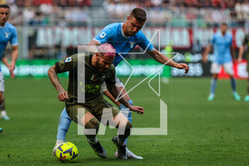 2023-05-06 - Theo Hernandez of AC Milan competes for the ball with Sergej Milinkovic-Savic of SS Lazio during Serie A 2022/23 football match between AC Milan and SS Lazio at San Siro Stadium, Milan, Italy on May 06, 2023 - AC MILAN VS SS LAZIO - ITALIAN SERIE A - SOCCER