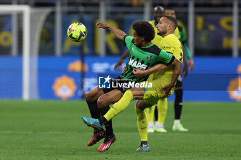 2023-05-13 - Armand Lauriente of US Sassuolo competes for the ball with Danilo D'Ambrosio of FC Internazionale during Serie A 2022/23 football match between FC Internazionale and US Sassuolo at Giuseppe Meazza Stadium, Milan, Italy on May 13, 2023 - INTER - FC INTERNAZIONALE VS US SASSUOLO - ITALIAN SERIE A - SOCCER