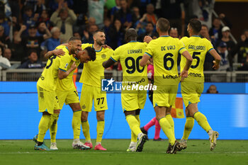 2023-05-13 - Raoul Bellanova of FC Internazionale celebrates with his teammates after scoring a goal during Serie A 2022/23 football match between FC Internazionale and US Sassuolo at Giuseppe Meazza Stadium, Milan, Italy on May 13, 2023 - INTER - FC INTERNAZIONALE VS US SASSUOLO - ITALIAN SERIE A - SOCCER