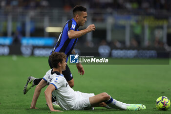 2023-05-27 - Giorgio Scalvini of Atalanta BC competes for the ball with Lautaro Martinez of FC Internazionale during Serie A 2022/23 football match between FC Internazionale and Atalanta BC at Giuseppe Meazza Stadium, Milan, Italy on May 27, 2023 - INTER - FC INTERNAZIONALE VS ATALANTA BC - ITALIAN SERIE A - SOCCER