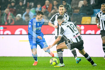 2023-01-04 - Empoli's Francesco Caputo in action against Udinese's Nehuen Perez - UDINESE CALCIO VS EMPOLI FC - ITALIAN SERIE A - SOCCER