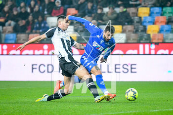 2023-01-04 - Udinese's Nehuen Perez in action against Empoli's Francesco Caputo - UDINESE CALCIO VS EMPOLI FC - ITALIAN SERIE A - SOCCER