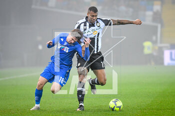 2023-01-04 - Empoli's Razvan Marin in action against Udinese's Walace Souza Silva - UDINESE CALCIO VS EMPOLI FC - ITALIAN SERIE A - SOCCER