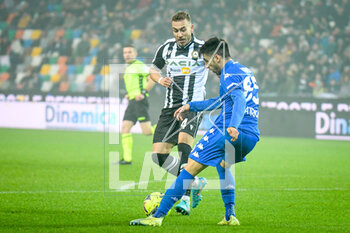 2023-01-04 - Empoli's Sebastiano Luperto in action against Udinese's Sandi Lovric - UDINESE CALCIO VS EMPOLI FC - ITALIAN SERIE A - SOCCER