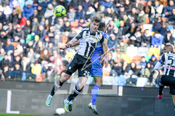 2023-02-12 - Header of Udinese's Jaka Bijol hindered by Sassuolo's Gregoire Defrel - UDINESE CALCIO VS US SASSUOLO - ITALIAN SERIE A - SOCCER