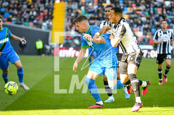 2023-02-12 - Udinese's Enzo Ebosse in action against Sassuolo's Andrea Pinamonti - UDINESE CALCIO VS US SASSUOLO - ITALIAN SERIE A - SOCCER