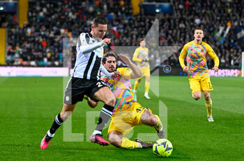 2023-02-26 - Udinese's Filip Benkovic and Spezia’s Dimitrios Nikolaou in action - UDINESE CALCIO VS SPEZIA CALCIO - ITALIAN SERIE A - SOCCER