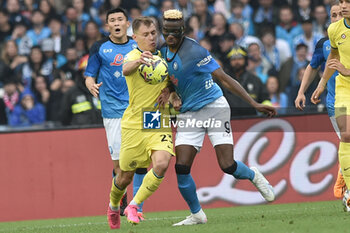 2023-05-21 - Nicolo' Barella of FC Internazionale competes for the ball with Victor Osimhen of SSC Napoli during the Serie A match between SSC Napoli vs FC Inter at Diego Armando Maradona Stadium - SSC NAPOLI VS INTER - FC INTERNAZIONALE - ITALIAN SERIE A - SOCCER