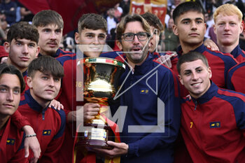 2023-04-29 - The A.S. Roma U19 celebrate the victory of Coppa Italia during the 32th day of the Serie A Championship between A.S. Roma vs A.C. Milan on April 29, 2023 at the Stadio Olimpico in Rome, Italy. - AS ROMA VS AC MILAN - ITALIAN SERIE A - SOCCER
