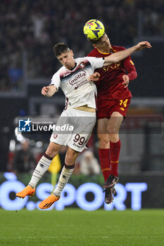 2023-05-22 - Diego Javier Llorente Rios of A.S. Roma and Krzysztof Piatek of U.S. Salernitana during the 36th day of the Serie A Championship between A.S. Roma vs U.S. Salernitana 1919 on May 22, 2023 at the Stadio Olimpico in Rome, Italy. - AS ROMA VS US SALERNITANA - ITALIAN SERIE A - SOCCER