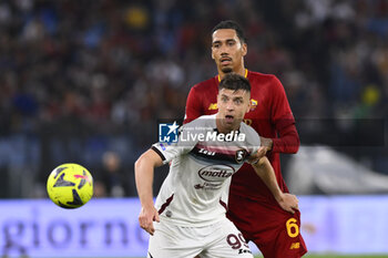 2023-05-22 - Krzysztof Piatek of U.S. Salernitana 1919 and Chris Smalling of A.S. Roma during the 36th day of the Serie A Championship between A.S. Roma vs U.S. Salernitana 1919 on May 22, 2023 at the Stadio Olimpico in Rome, Italy. - AS ROMA VS US SALERNITANA - ITALIAN SERIE A - SOCCER