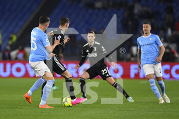 2023-04-08 - Nicolò Casale of S.S. LAZIO and Dušan Vlahović of Juventus F.C. during the 29th day of the Serie A Championship between S.S. Lazio vs Juventus F.C. on April 8, 2023 at the Stadio Olimpico in Rome, Italy. - SS LAZIO VS JUVENTUS FC - ITALIAN SERIE A - SOCCER