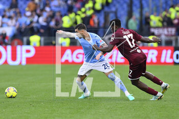 2023-04-22 - Mattia Zaccagni of S.S. LAZIO and Wilfried Singo of Torino F.C. during the 31th day of the Serie A Championship between S.S. Lazio vs Torino F.C. on April 22, 2023 at the Stadio Olimpico in Rome, Italy. - SS LAZIO VS TORINO FC - ITALIAN SERIE A - SOCCER