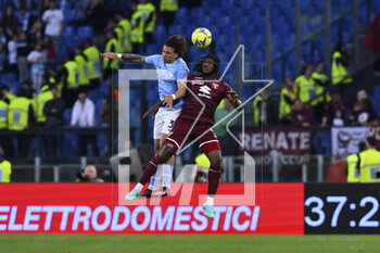 2023-04-22 - Luca Pellegrini of S.S. Lazio and Andreaw Gravillon of Torino F.C. during the 31th day of the Serie A Championship between S.S. Lazio vs Torino F.C. on April 22, 2023 at the Stadio Olimpico in Rome, Italy. - SS LAZIO VS TORINO FC - ITALIAN SERIE A - SOCCER