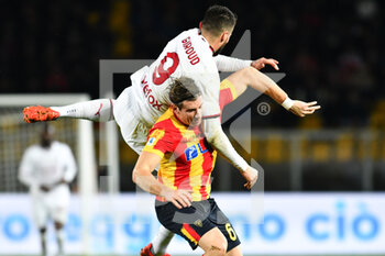 2023-01-14 - Lorenzo Colombo, forward of Lecce and Olivier Giroud, striker of Milan, during the Italian championship Serie A football match between US Lecce and AC Milan on January 14, 2023 at Via del Mare stadium in Lecce, Italy - FOOTBALL - ITALIAN CHAMP - LECCE V AC MILAN - ITALIAN SERIE A - SOCCER