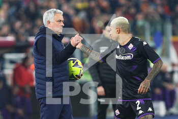 2023-01-15 - Jose' Mourinho of Roma (L) and Domilson Cordeiro Dos Santos of Fiorentina (R) greet each other during the Italian championship Serie A football match between AS Roma and ACF Fiorentina on January 15, 2023 at Stadio Olimpico in Rome, Italy - FOOTBALL - ITALIAN CHAMP - AS ROMA V FIORENTINA - ITALIAN SERIE A - SOCCER