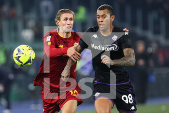 2023-01-15 - Ola Solbakken of Roma (L) vies for the ball with Igor Julio Dos Santos De Paulo of Fiorentina (R) during the Italian championship Serie A football match between AS Roma and ACF Fiorentina on January 15, 2023 at Stadio Olimpico in Rome, Italy - FOOTBALL - ITALIAN CHAMP - AS ROMA V FIORENTINA - ITALIAN SERIE A - SOCCER