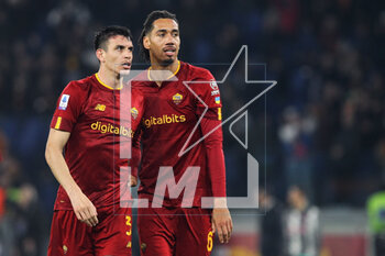 2023-03-05 - Roger Ibanez (L) and Chris Smalling (R) of Roma celebrate the victory at the end of the Italian championship Serie A football match between AS Roma and Juventus FC on March 5, 2023 at Stadio Olimpico in Rome, Italy - FOOTBALL - ITALIAN CHAMP - ROMA V JUVENTUS - ITALIAN SERIE A - SOCCER