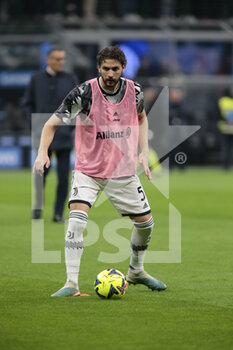 2023-03-19 - Manuel Locatelli of Juventus warming up during the Italian Serie A football match between Fc Internazionale and Juventus Fc, on 19 March 2023 at Stadio Giuseppe Meazza, San Siro, Milan, Italy. Photo Nderim Kaceli - INTER - FC INTERNAZIONALE VS JUVENTUS FC - ITALIAN SERIE A - SOCCER