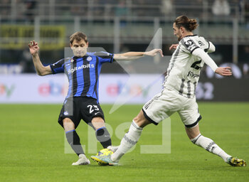 2023-03-19 - Nicolo Barella of FC Internazionale and Adrien Rabiot of Juventus during the Italian Serie A football match between Fc Internazionale and Juventus Fc, on 19 March 2023 at Stadio Giuseppe Meazza, San Siro, Milan, Italy. Photo Nderim Kaceli - INTER - FC INTERNAZIONALE VS JUVENTUS FC - ITALIAN SERIE A - SOCCER