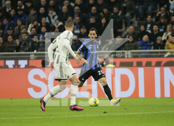 2023-03-19 - Hakan Calhanoglu of FC Internazionale during the Italian Serie A football match between Fc Internazionale and Juventus Fc, on 19 March 2023 at Stadio Giuseppe Meazza, San Siro, Milan, Italy. Photo Nderim Kaceli - INTER - FC INTERNAZIONALE VS JUVENTUS FC - ITALIAN SERIE A - SOCCER