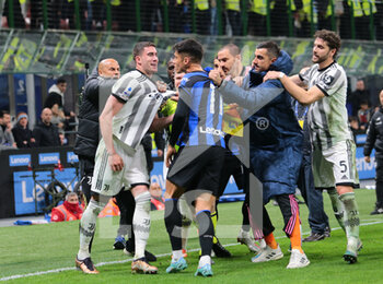 2023-03-19 - Joaquin Correa of FC Internazionale and Dusan Vlahovic of Juventus during the Italian Serie A football match between Fc Internazionale and Juventus Fc, on 19 March 2023 at Stadio Giuseppe Meazza, San Siro, Milan, Italy. Photo Nderim Kaceli - INTER - FC INTERNAZIONALE VS JUVENTUS FC - ITALIAN SERIE A - SOCCER