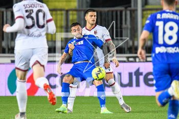 2023-05-04 - Empoli's Francesco Caputo thwarted by Bologna's Kevin Bonifazi - EMPOLI FC VS BOLOGNA FC - ITALIAN SERIE A - SOCCER