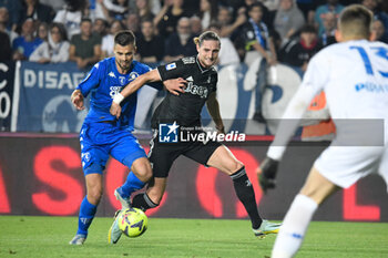 2023-05-22 - Juventus's Adrien Rabiot fights for the ball against Empoli's Alberto Grassi - EMPOLI FC VS JUVENTUS FC - ITALIAN SERIE A - SOCCER