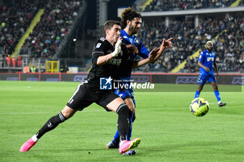 2023-05-22 - Juventus's Dusan Vlahoviv fights for the ball against Empoli's Sebastiano Luperto - EMPOLI FC VS JUVENTUS FC - ITALIAN SERIE A - SOCCER