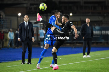 2023-05-22 - Juventus's Filip Kostic hampered by Empoli's Tyronne Ebuehi - EMPOLI FC VS JUVENTUS FC - ITALIAN SERIE A - SOCCER