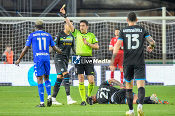 2023-06-03 - Referee Mr. Luca Massimi shows yellow card to Empoli's Jean-Daniel Akpa Akpro - EMPOLI FC VS SS LAZIO - ITALIAN SERIE A - SOCCER