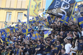 2023-06-11 - Hellas Verona fans show their support during Spezia Calcio vs Hellas Verona FC, Play-off Serie A Tim 2022-23 game at Mapei Stadium - Città del Tricolore in Reggio Emilia (RE), Italy, on June 11, 2023. - SPEZIA CALCIO VS HELLAS VERONA - ITALIAN SERIE A - SOCCER