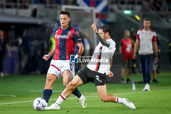 2023-08-21 - Bologna's Nikola Moro In action against Milan's Davide Calabria - BOLOGNA FC VS AC MILAN - ITALIAN SERIE A - SOCCER