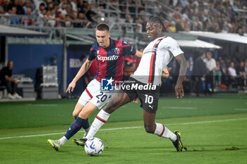 2023-08-21 - Milan's Rafael Leao in action against Bologna's Michel Aebischer - BOLOGNA FC VS AC MILAN - ITALIAN SERIE A - SOCCER
