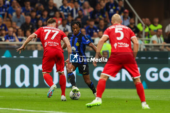 2023-08-19 - Juan Cuadrado of FC Internazionale seen in action during Serie A 2023/24 football match between FC Internazionale and AC Monza at Giuseppe Meazza Stadium, Milan, Italy on August 19, 2023 - INTER - FC INTERNAZIONALE VS AC MONZA - ITALIAN SERIE A - SOCCER