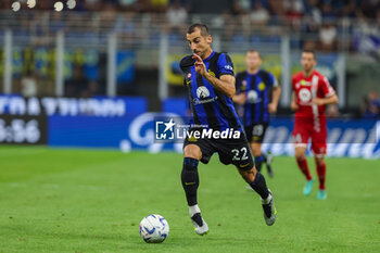2023-08-19 - Henrikh Mkhitaryan of FC Internazionale seen in action during Serie A 2023/24 football match between FC Internazionale and AC Monza at Giuseppe Meazza Stadium, Milan, Italy on August 19, 2023 - INTER - FC INTERNAZIONALE VS AC MONZA - ITALIAN SERIE A - SOCCER