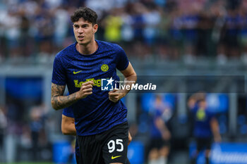 2023-08-19 - Alessandro Bastoni of FC Internazionale warms up during Serie A 2023/24 football match between FC Internazionale and AC Monza at Giuseppe Meazza Stadium, Milan, Italy on August 19, 2023 - INTER - FC INTERNAZIONALE VS AC MONZA - ITALIAN SERIE A - SOCCER