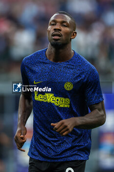 2023-08-19 - Marcus Thuram of FC Internazionale warms up during Serie A 2023/24 football match between FC Internazionale and AC Monza at Giuseppe Meazza Stadium, Milan, Italy on August 19, 2023 - INTER - FC INTERNAZIONALE VS AC MONZA - ITALIAN SERIE A - SOCCER